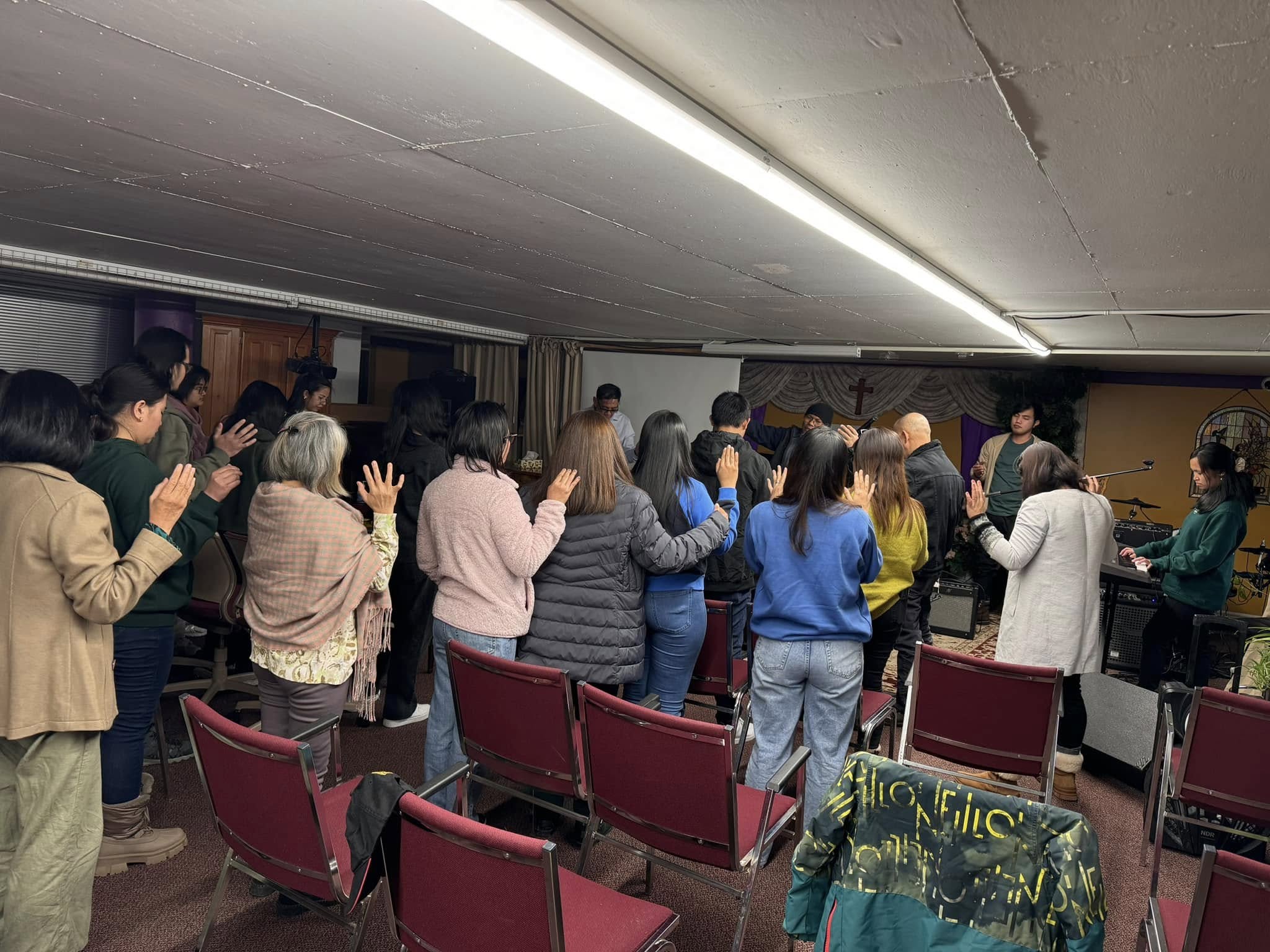 Congregation gathered in worship at Church of God Saviour King